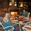 dining on the deck at night at Volare
