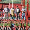 construction team of Volare standing on girder above valley